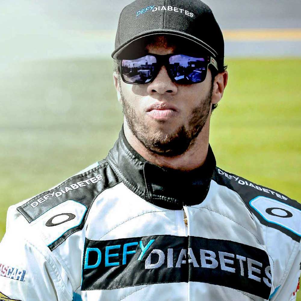 NASCAR driver wearing defy diabetes logo jacket